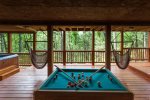 Bumper pool table, hot tub and swings
